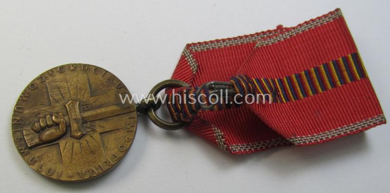Romanian medal: 'Kreuzzug gegen den Kommunismus' (or in Romanian language: 'Medalia - Crusiada Impotriva Communismului') that comes mounted onto its original (and neatly pre-confectioned!) ribbon as issued