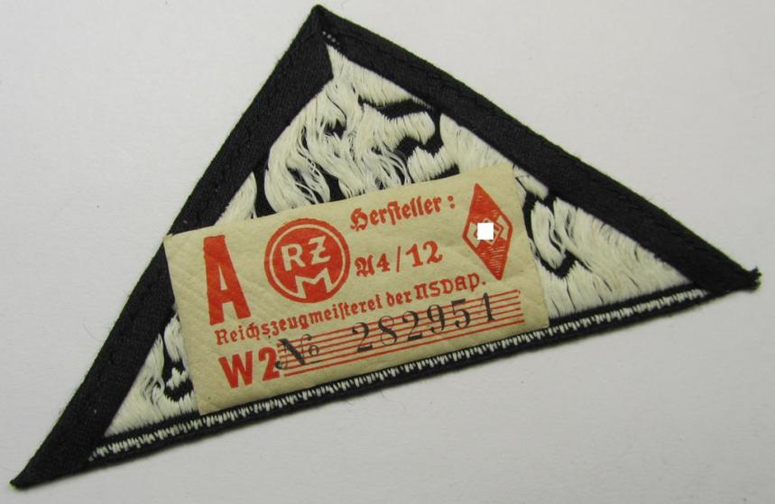 Attractive, 'HJ' ('Hitlerjugend') ie. 'BDM' ('Bund Deutscher Mädel'-) district-triangle (ie. 'Gebietsdreieck') entitled: 'Süd Württemberg' (being a never worn example that still retains its period-attached 'RzM'-etiket)