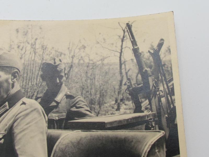 Photo of a Wehrmacht Soldiers in a car