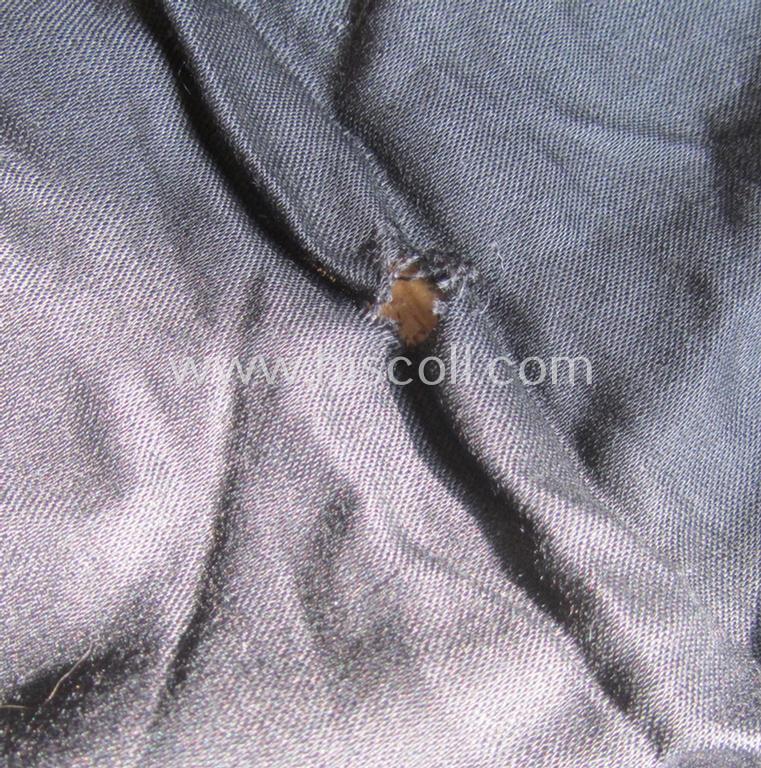 'HJ' ('Hitlerjugend') ie. 'BDM' (or: 'Bund Deutscher Mädel') so-called: 'Halstuch' as executed in typical black-coloured linnen still retaining its period RzM-etiket (and that comes with its leather-based 'Knote')