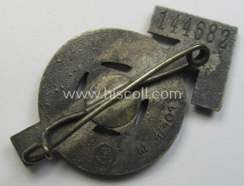 Attractive, HJ- (ie. 'Hitlerjugend'-) sports-badge (or: 'HJ-Leistungsrune') of the silver-class being a clearly maker- (ie. 'RzM - M1/101'-) marked- and/or: 'Buntmetall'-based specimen that shows an engraved (unique) bearers'-numeral ('1446...