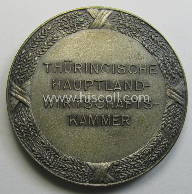 Unusual, silverish-toned 'TR'-period commemorative-award-plaque depicting a kneeling woman and entitled: 'Thüringsche Hauptland-Wirtschafts-Kammer' and that comes stored in its period- and 'Carl Poellath'-marked etui