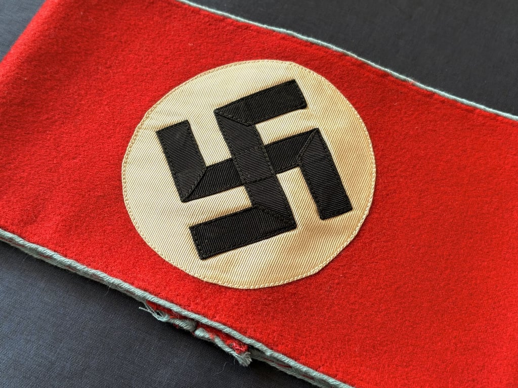 AUTHENTIC WWII GERMAN THIRD REICH ORTSGRUPPENLEITER ARMBAND WITH RZM LABEL.