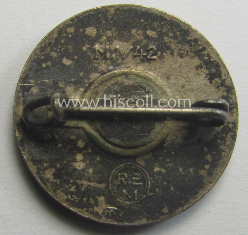 'N.S.D.A.P. - Parteiabzeichen' showing the makers'-designation: 'RzM' and/or: 'M1/42'