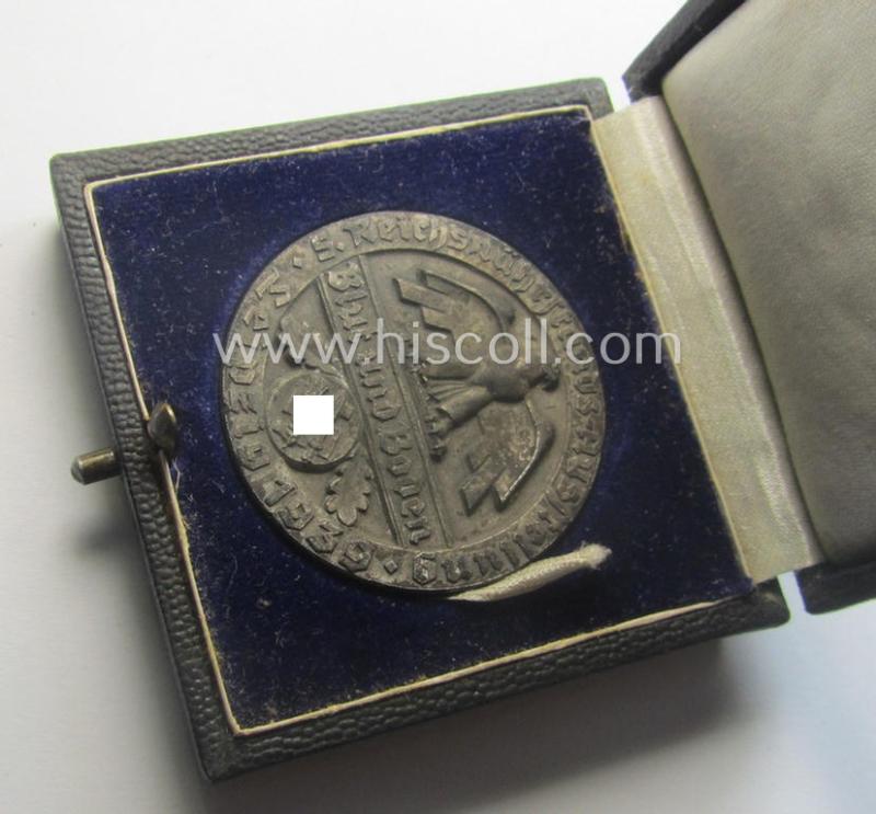 Greyish-silver-toned, 'Reichsnährstand'- (ie. 'RNSt.'-) related, commemorative-award-plaque entitled: '5. Reichsnährstands-Austellung - Blut und Boden - Leipzig 1939 - Rohmilch' and that comes stored in its period etui