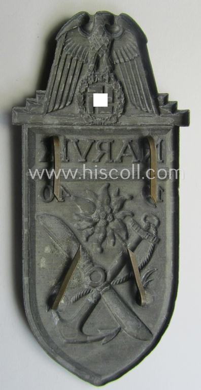 'Virtually mint' - albeit regrettably incomplete - example of a WH (Heeres etc.) 'Narvik'-campaign-shield as executed in typical: 'Feinzink' (as was presumably produced by the: 'Wilhelm Deumer'-company)