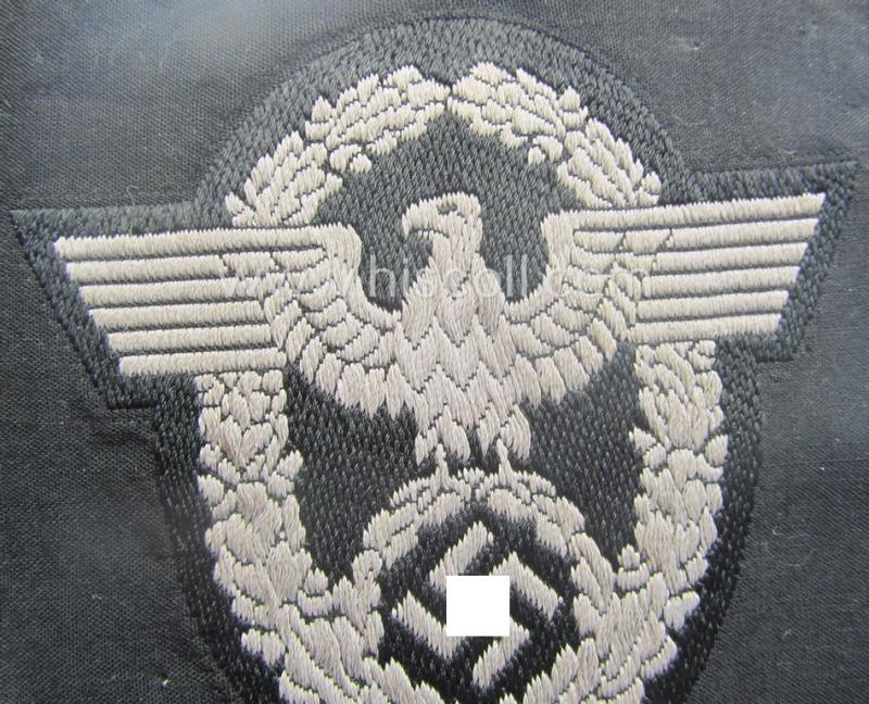 Police- (ie. 'Polizei- o. Panzer'-) related armbadge (ie. arm-eagle) being a typical 'BeVo'-woven example (as was specifically produced for usage onto the black-coloured, 'wrap-around'-styled Panzer-tunics)