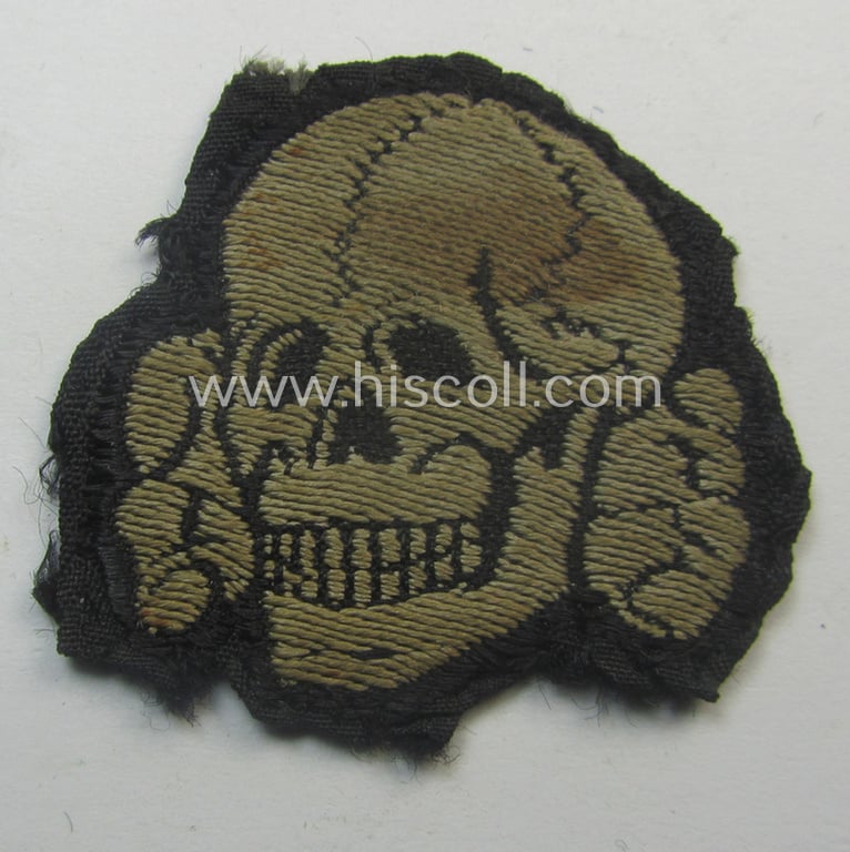 Superb - and nowadays rarely encountered! - Waffen-SS, 'BeVo'-woven-style skull- and cap-eagle-set (ie. 'Totenkopf- u. Adler-Effektensatz für Schiffchen o. Einheitsfeldmütze') that comes in a moderately used- and/or cap-removed, condition