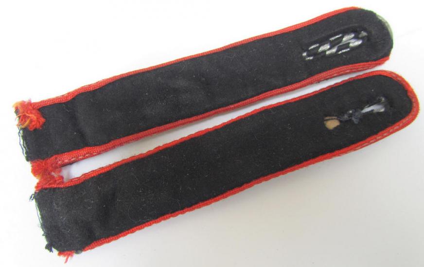 Attractive - and almost matching - pair of N.S.K.K. (or: 'National Socialistisches Kraftfahr Korps') shoulderboards as piped in the bright-red coloured branchcolour, as was intended for usage by the Dutch NSKK-volunteers