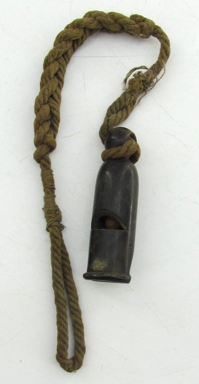 Wehrmacht issue signal whistle with lanyard