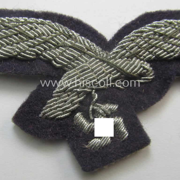 'Virtually mint' WH (Luftwaffe) officers'-pattern breast-eagle (ie. 'Brustadler für Offiziere der Luftwaffe') being a neatly hand-embroidered example of the: 'Extra Qualität' that comes in a never used- nor tunic-attached, condition