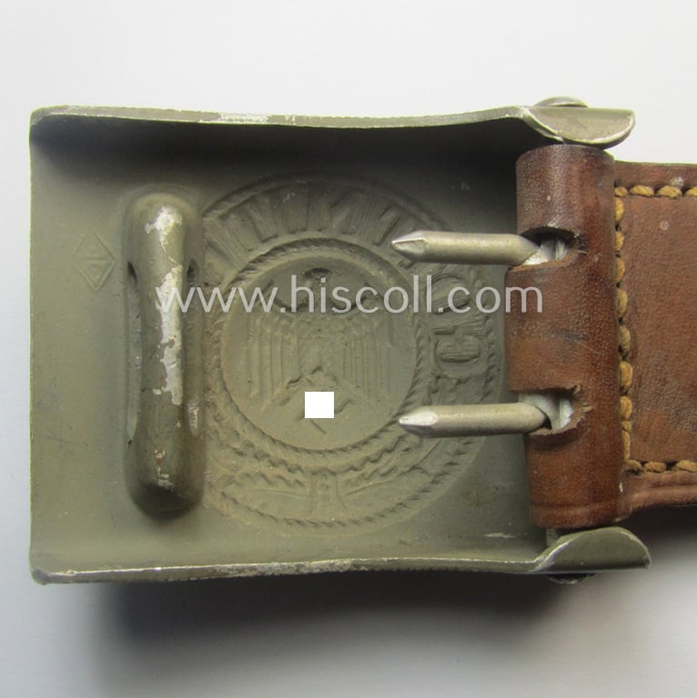 Superb, WH (Heeres) 'standard-pattern', field-grey-toned- and aluminium-based belt-buckle being a maker- (ie. 'Overhoff & Cie.'-) marked- and/or: '1938'-dated example that comes mounted onto its leather-based tab