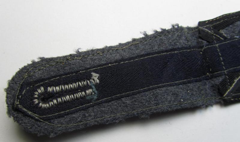 Single - but nevertheless scarcely seen! - 'Ostvölker'-related, 'Luftwaffe'-type shoulderstrap showing the black-coloured piping (and having a pair of horizontally-mounted rank-stripes 'off-factory'-attached)