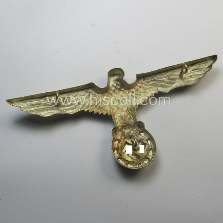 Larger-sized, WH (Kriegsmarine): 'DAK' (ie. 'Deutsches Afrikakorps') 'Buntmetall versilbertes' so-called: 'pith-helmet' eagle-device as intended for: 'Beamten der Kriegsmarine'