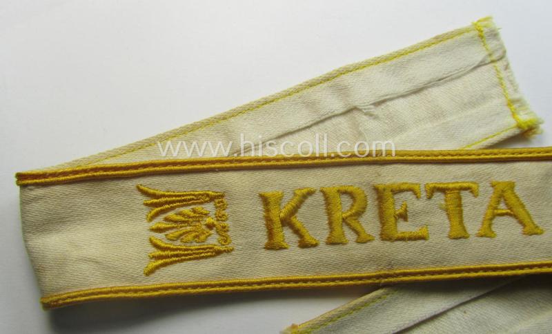 WH (Luftwaffe o. Heeres) cuff-title (ie. 'Ärmelstreifen') entitled: 'Kreta' that comes in a presumably issued- (albeit I deem never used- ie. 'virtually mint'-), condition
