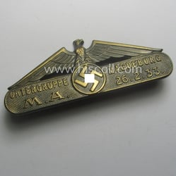 Golden-bronze-toned, early-period N.S.D.A.P.-related day-badge (ie. 'tinnie') being a...