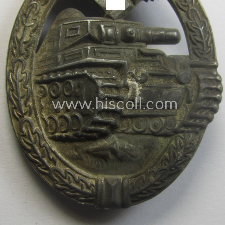 'Hollow'-styled, 'Panzerkampfabzeichen in Silber' (or: silver-class panzer-assault badge or PAB) being a detailed- and/or: zinc- (ie. 'Feinzink'-) based version as was procuced by the: 'B.H. Mayer'- (ie. 'Otto Schickle'-) company