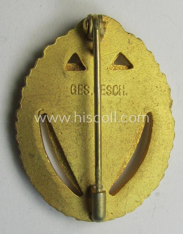 Attractive, honorary-membership lapel-pin (aka: 'Goldene Ehrennadel für 50 Jahre Mitgliedschaft im Deutscher Reichskriegerbund Kyffhäuser' (ie. 'D.R.K.B.') being a non-maker-marked example that bears a: 'Ges.Gesch.'-designation on its back