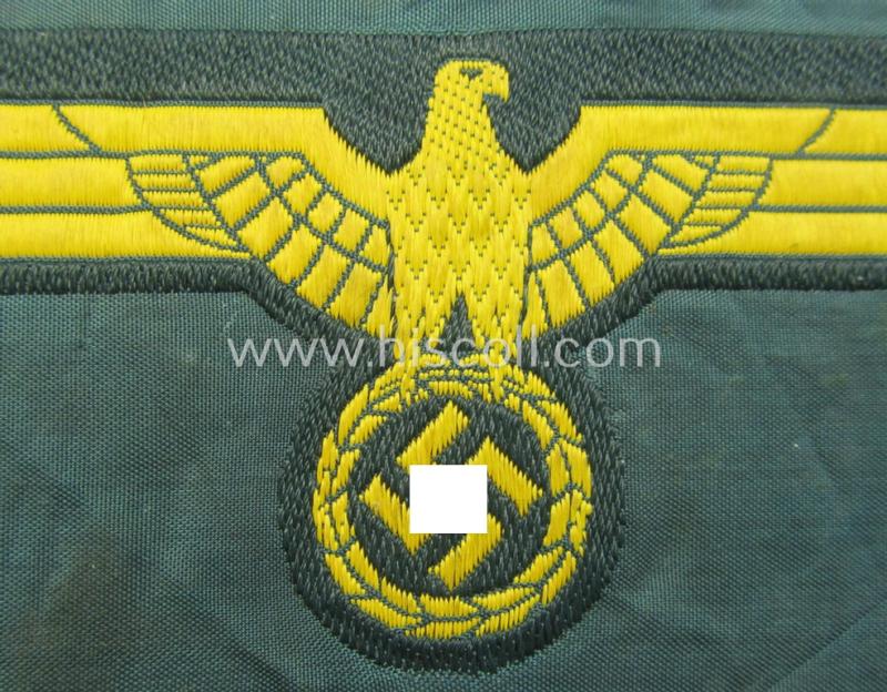WH (Kriegsmarine) ie. 'Küsten-Art.'-related breast-eagle (ie. 'Brustadler für Mannschaften u. Uffz. der Küsten-Artillerie-Truppen') being a 'standard-pattern-example as executed in the 'BeVo'-weave-pattern on a darker-green-coloured background