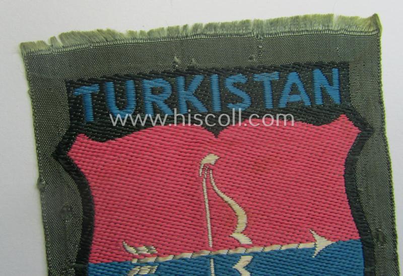 'BeVo'-type armshield entitled: 'Turkistan' (being of the scarcely encountered third and/or final pattern!) that was intended for a volunteer who served within the: 'Deutsche Wehrmacht' ie. within the: 'Turkistanisches Legion'