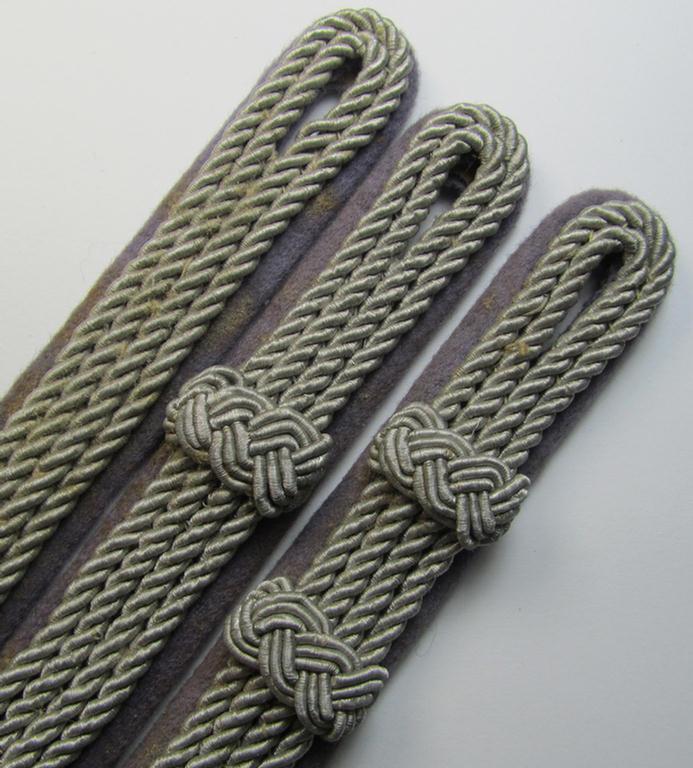 Interesting, three-pieced grouping comprising of 3 single, 'Luftschutz' (ie. RLB-related) officers'-pattern shoulderboards ('Schulterstucke') as intended for: 'RLB'-officers holding the ranks of: 'Luftschutzführer' upto 'Luftschutz-Hauptfüh...