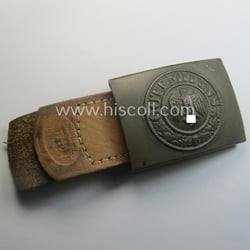 Minimally used, WH (Heeres) field-grey-coloured- and/or steel-based belt-buckle...