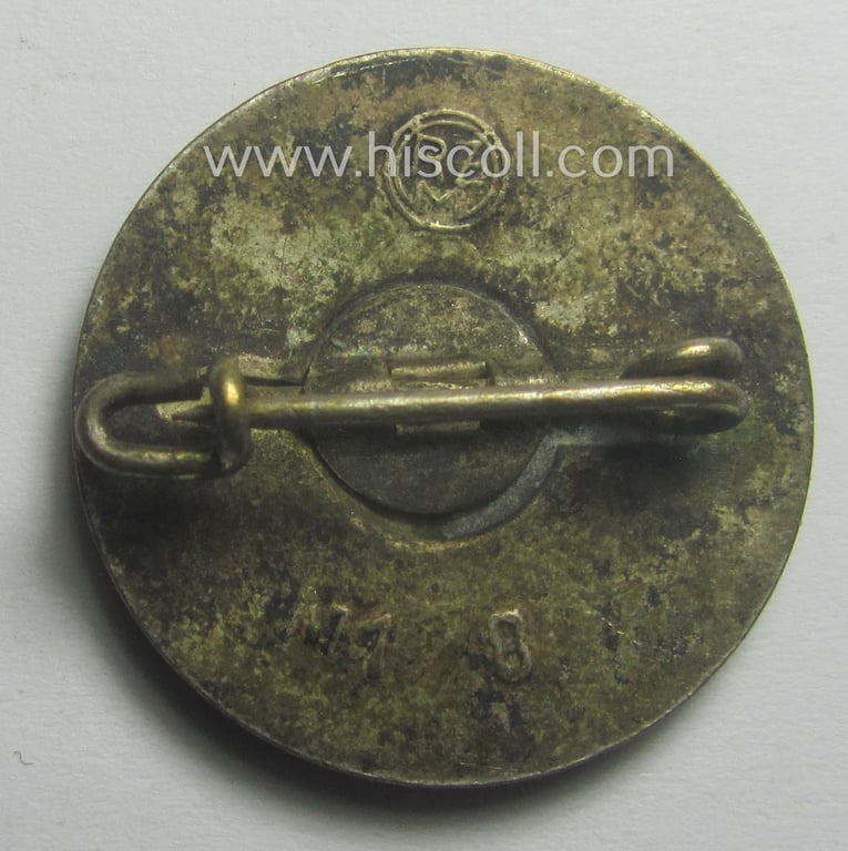 'N.S.D.A.P.'-membership-pin- ie. party-badge (or: 'Parteiabzeichen') which is maker-marked on its back with the makers'-designation: 'RzM' and/or: 'M1/8' (= 'Ferdinand Wagner - Pforzheim')