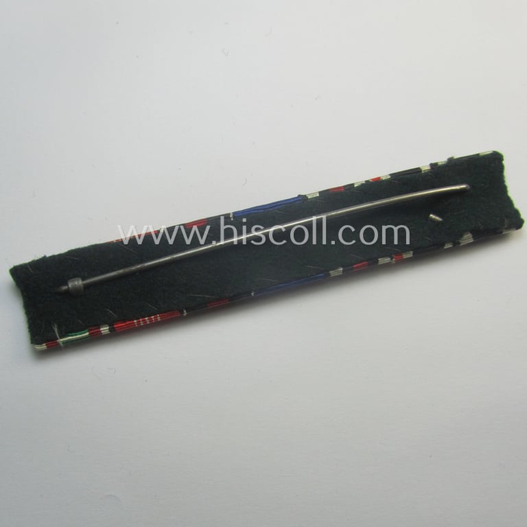 7-pieced, WWI- (ie. WWII-) period (ie. 'Polizei'-related) ribbon-bar (ie. 'Feld- o. Bandspange') showing (amongst others) an 'EKII.Kl.', a: 'FKK m. S.', a: 'Pol.-DA 1. Stf.', a: 'Deu. Olympia-.E. medal 1936' and an Austrian, WWI-commemorative-medal