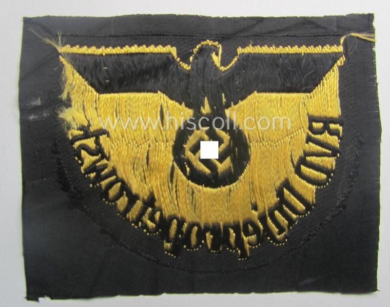 RB- ('Reichsbahn'-) related arm-eagle as executed in 'BeVo'-weave style, as was intended for an official of the: 'Deutsche Reichsbahn' ie. the: 'RVD Dnjepropetrowsk' (or: 'Reichsverkehrsdirektion Dnjepropetrowsk')