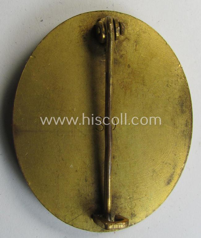 Superb - and just moderately used- and/or worn! - 'Verwundeten-Abzeichen in Gold' being a clearly maker- (ie. '30'-) marked- and 'Buntmetall'-based example as was produced by the Austrian maker (ie. 'Hersteller') named: 'Hauptmünzamt Wien'