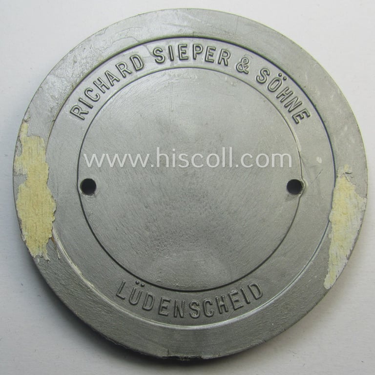 Greyish-silver-coloured- and 'molded'-resin-based, N.S.K.K.- (ie. 'National Socialistisches Kraftfahr Korps-') related plaque (ie. 'Plakette') bearing the text: 'Ein Volk, ein Reich, ein Führer! - NSKK Wahlhilfsdienst - 10. April 1938'