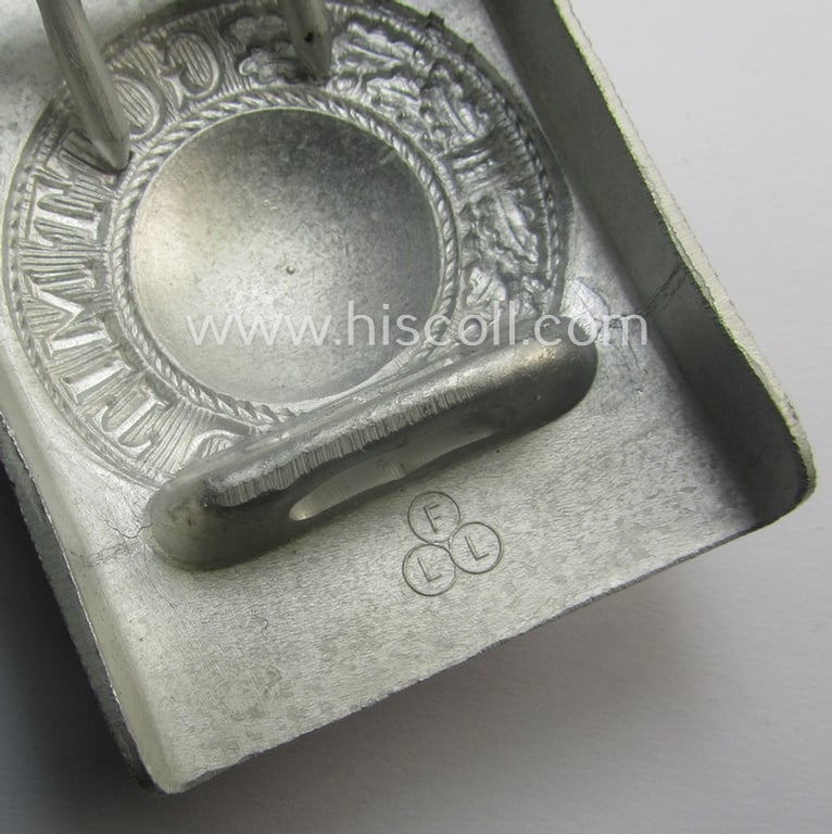 Very unusual - and actually never before seen! - aluminium-based WH belt-buckle (ie. 'Koppelschloss für Mannschaften u. Uffz.') being a maker- (ie. 'F.L.L.'-) marked example that comes in a fully untouched, condition