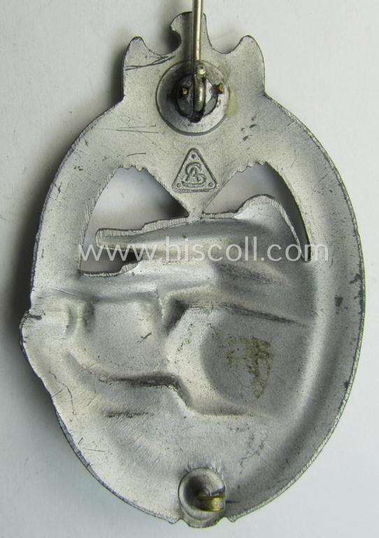 'Panzerkampfabzeichen in Silber' (or: silver-class panzer-assault badge or PAB) being a clearly maker- (ie. 'AS' in a triangle-) marked- and/or typical zinc- (ie. 'Feinzink'-) based specimen as was procuced by a to date unknown maker