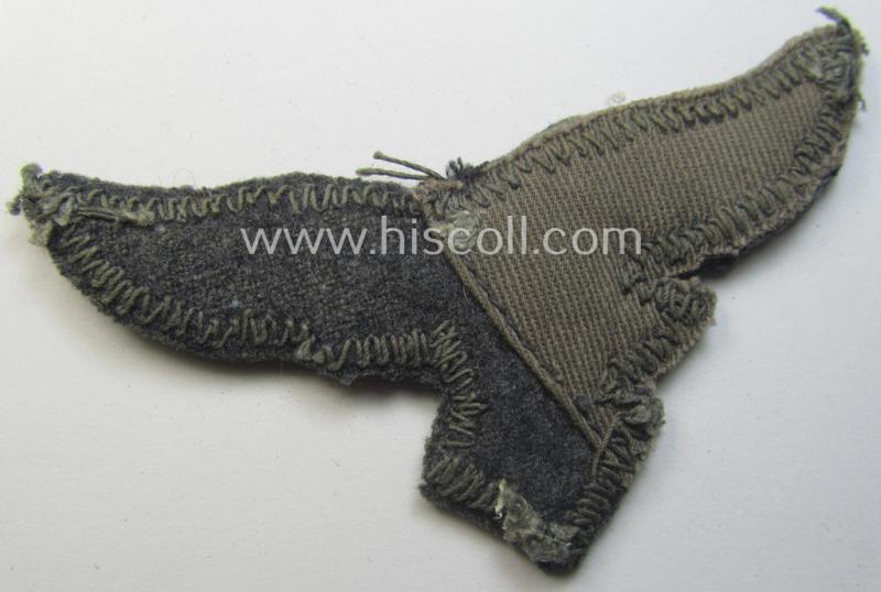 'Cut-out of a tunic' - WH (Luftwaffe) EM- (ie. NCO-) type breasteagle (ie. 'Brustadler für Mannschaften und Unteroffiziere der Luftwaffe')