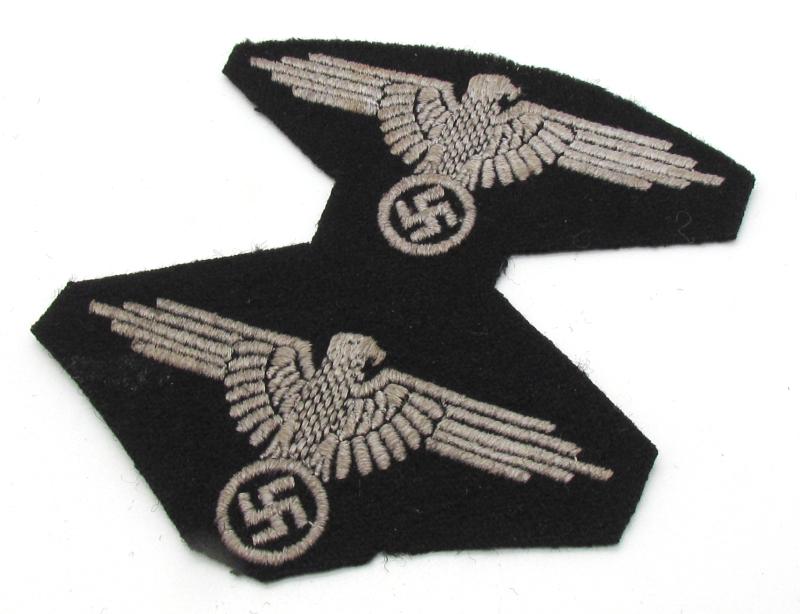 2x Waffen-SS Sleeve Eagles on a factory Sheet