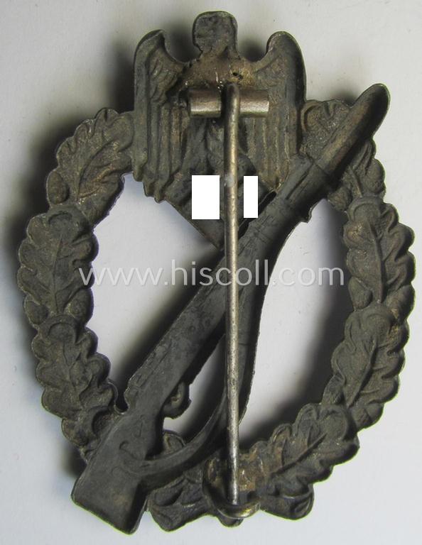 Superb - and/or truly detailed! - 'hollow-back'-pattern 'Infanterie-Sturmabzeichen in Bronze' being a clearly maker- (ie. 'A'-) marked example by the: 'Assmann'-company as executed in bronze-toned- and zinc-based metal (ie. 'Feinzink')