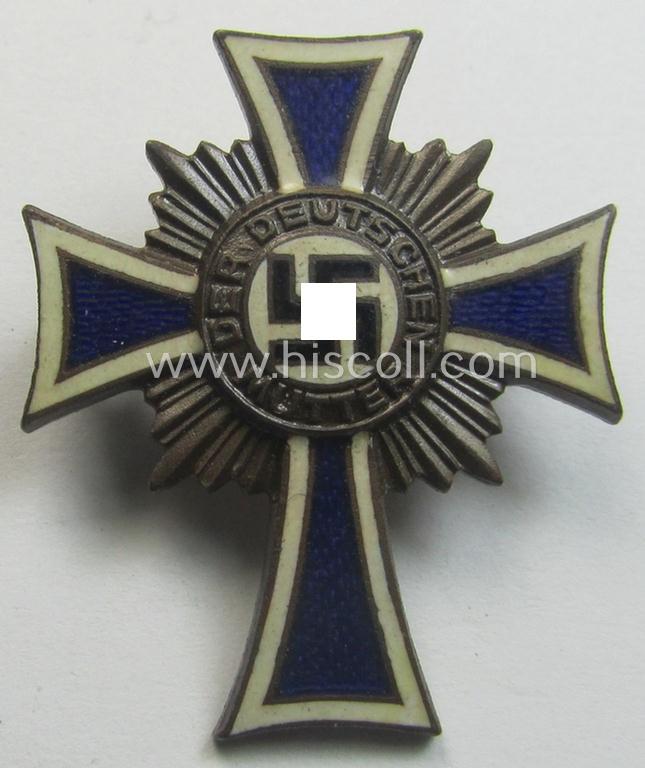 Superb - and rarely found! - miniature (ie. 'Halbminiatur') of an: 'Ehrenkreuz der deutschen Mutter - dritte Stufe' (or: bronze-class mothers'-cross) being a non-maker-marked example that comes in an overall very nice condition