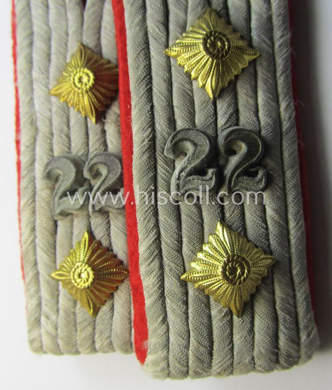 Attractive - and fully matching! - pair of WH (Heeres) neatly 'cyphered', officers'-type shoulderboards as piped in the bright-red-coloured branchcolour as was intended for usage by a: 'Hauptmann des Artillerie  Regiments 22'