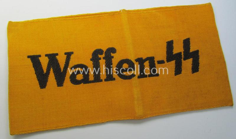 Superb, golden-yellow-coloured- and/or linnen-based armband (ie. 'Armbinde') entitled: 'Waffen-SS' that comes in an overall very nice- (albeit moderately used ie. worn-), condition