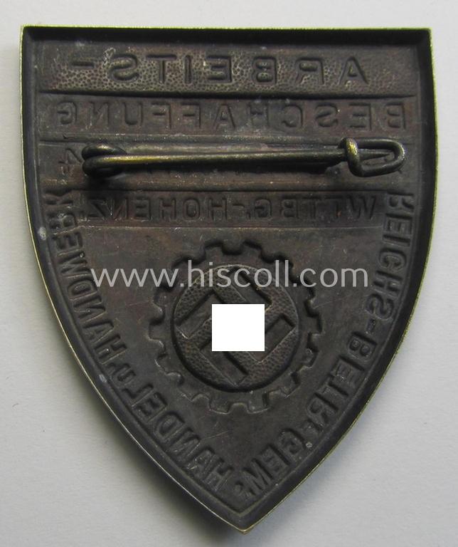 Silver-toned- (and/or tin-based) RAD- (ie. 'Reichsarbeitsdienst'-) related day-badge depicting a so-called: 'RAD-Zahnrad' and text: 'Arbeitsbeschaffung - 28.9.-14.10.1934 - Wttbg. Hohenz.' and sub-titled: 'Reichs-Betr. Gem. - Handel u. Handwer...