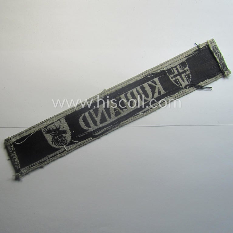 WH (Heeres ie. Kriegsmarine) cuff-title- ie. armband (ie. 'Ärmelstreifen') entitled: 'Kurland' that comes in an overall very nice- (albeit clearly used- ie. tunic-removed-), condition