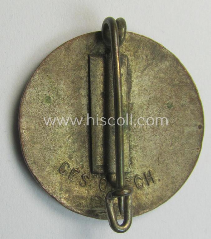 Attractive - darker-red-coloured and very nicely preserved! - 'variant'-pattern 'N.S.D.A.P.'-supporter-pin- ie. party-badge (or: 'Parteiabzeichen') being a regular-sized specimen that shows a 'Ges.Gesch.'-patent-pending-designation