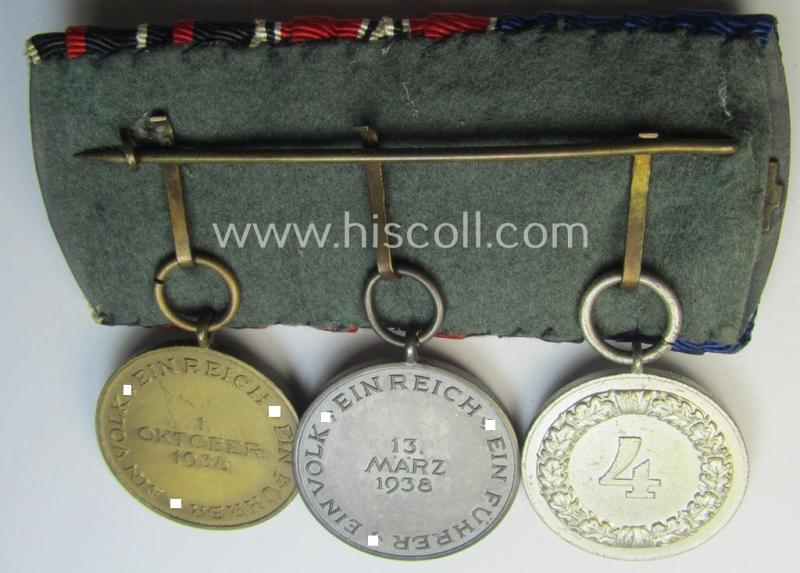 3-pieced WWII-period medal-bar (ie. 'Ordenspange') of the desirable 'detachable'-pattern showing resp. a: 'WH-Dienstauszeichnung der 4. Stufe' and two (Austrian and/or Czech) 'Anschluss'-medals