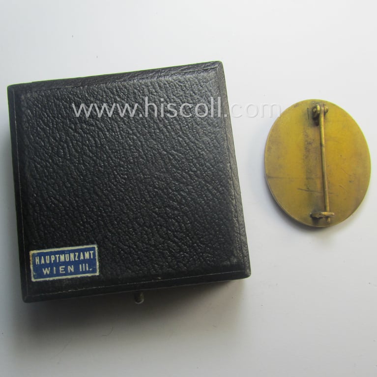 'Verwundeten-Abzeichen in Gold' being a non-maker-marked- and typical 'Buntmetall'-based (ie. 'thin-pinned'!) example that comes stored in its maker- (ie. 'Hauptmünzamt - Wien'-) marked etui as issued