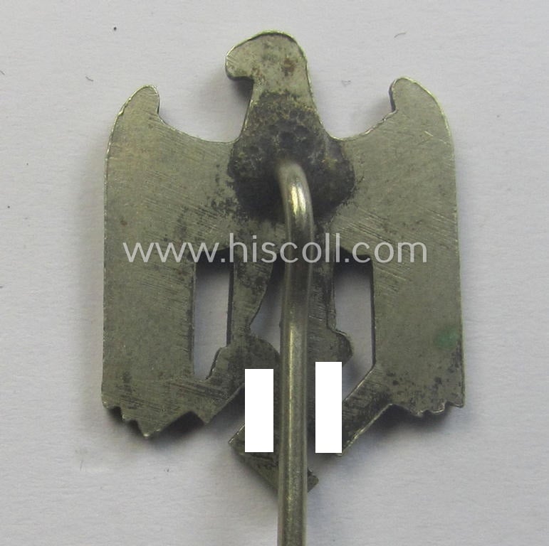 Silver-toned- (and: 'Buntmetall'-based) WH (Heeres) so-called: 'Zivilabzeichen' (or: army civil-attire badge) being a very detailed (albeit non-maker-marked) example that comes mounted onto its long-sized pin