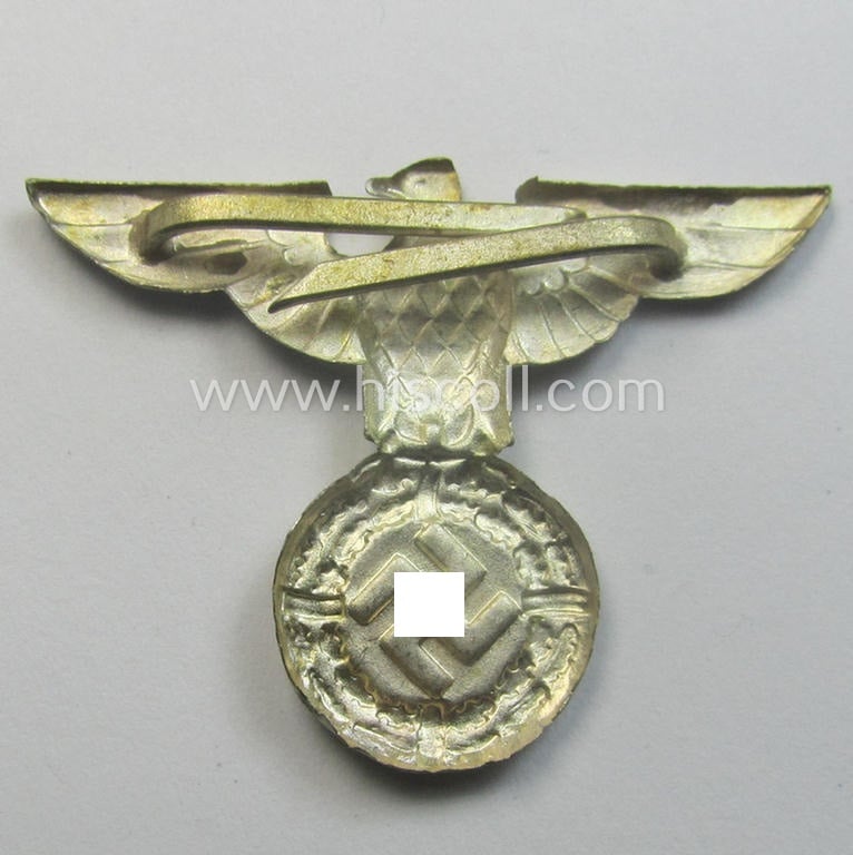 Silver-toned - and I deem 'Buntmetall'-based - early-pattern, SS- o. SA-type, political visor- (ie. 'Schirmmützen'-) cap- (ie. 'Kepi'-) eagle being a non-maker-marked example that comes in a still 'virtually mint- ie. unissued'-, condition