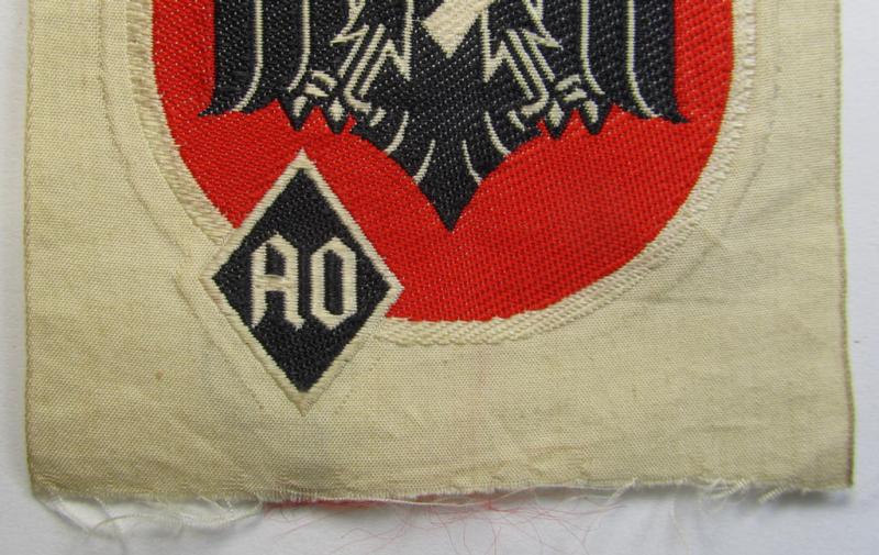 Superb example of a neatly machine- (ie. 'BeVo'-) woven NSRL- (ie. 'NS Reichsbund für Leibesübungen'-related sports'-tunic-patch as was specifically intended for usage by member witin the AO- (or: 'Ausland Organisation')