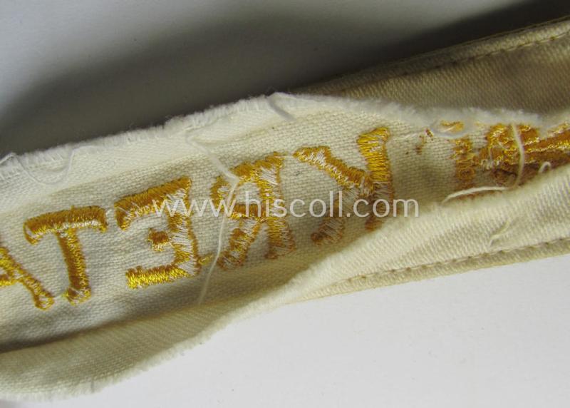 Superb, WH cuff-title (ie. 'Ärmelstreifen') entitled: 'Kreta' (being an example that bears a printed 'RbN.'-numeral and that comes in an issued-, clearly worn- and/or most certainly once tunic-attached, condition)