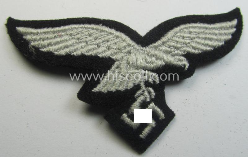 Attractive, WH (Luftwaffe) cap-eagle (being a 'standard-issue'-pattern example as executed onto a black-coloured and woolen-based  background and as such intended for usage on the black-coloured work- ie. 'HG'-related side-caps ie. 'Schiffchen'...