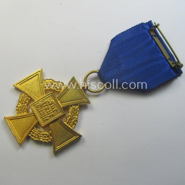 'Treuedienst Ehrenzeichen 1. Klasse' being a (typical) non-maker-marked example that came mounted onto its original ribbon (ie. 'Bandabschnitt') and that comes stored in its etui as issued